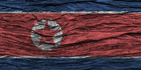 North korea flag with high detail of old wooden background . 3D illustration .の写真素材