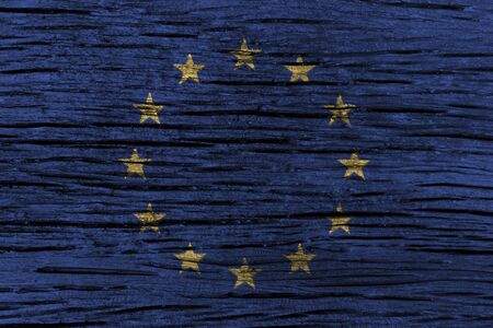 European Union ( EU ) flag with high detail of old wooden background . 3D illustration .の写真素材