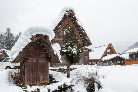 Shirakawago village with snow fall in winter season . Landmark of Gifu , Takayama , Japan .のeditorial素材