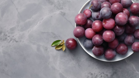 a beautiful arrangement of plums in a minimalist style, featuring a mix of light gray and navy colors, set against a polished concrete backdrop. ai generatedの素材