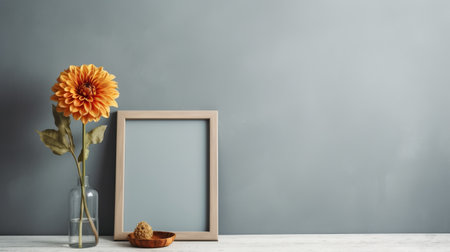 a simple yet elegant room layout featuring a blank wooden frame mounted on a gray wall, with a single zinnia flower placed in front of it. the natural light adds a warm and cozy touch to the overall ambiance. ai generatedの素材