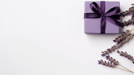 the purple gift box is beautifully wrapped with delicate lavender flowers, creating a stunning visual contrast against the minimalist white background. this animated gif is perfect for websites and social media posts, especially for those who appreciate the style of lawrence alma-tadema and minimalist photography. the dark and muted colors of the gift box and flowers add a touch of elegance and sophistication to anyの素材