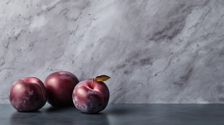 three plums sit delicately on a marble background, creating a captivating photography installation. the purple and gray hues blend seamlessly, enhanced by soft edges and atmospheric effects. this composition beautifully merges natural and man-made elements, resulting in a minimalist yet striking image. the light indigo and crimson tones add a touch of elegance to the overall simplicity of the scene. ai generatedの素材