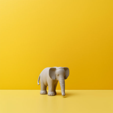 white elephant sculpture on a vibrant yellow backdrop, featuring a white plastic paw against a clean white background. this minimalist artwork showcases geometric shapes and is crafted with eco-friendly materials. the image is enhanced using darktable processing and focus stacking techniques, resulting in a striking combination of light yellow and dark gray tones. rendered in maya, the sculpture stands out with its bright and boldの素材