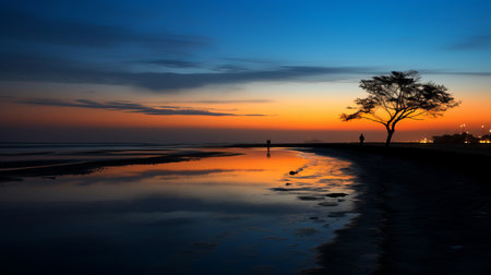 unidentified tree reflecting on the water's edge, showcasing a captivating blend of light orange and dark blue hues. this uhd image captures the beauty of beach portraits with silhouette figures. shot with the tokina at-x 11-16mm f/2.8 pro dx ii lens, it brings out the luminous color harmonies of this dutch marine scene. ai generatedの素材