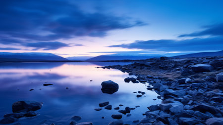 the photo showcases the breathtaking transformation of abisko's natural landscape into a mesmerizing wonderland during the blue hour. shot with a canon 5d, this high-quality, 16k, hd image captures the minimalist beauty of the scene, with its transparent hues and ethereal atmosphere. ai generatedの素材