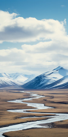 aerial view of a picturesque valley in iceland, surrounded by snow-covered mountains. the osterfjorden road winds through the stunning landscape, leading towards the majestic saser kangri iii peak. the image captures the beauty of nature in animated gif style, showcasing the snowy summit ridge of denali mountain. the photo is taken with tamron 20mm f/2.8 di iii osd m1:2 and 24mm f/2.8 di iii osdの素材