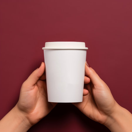 a cup of peanut butter coffee sits on a dark background, surrounded by images of peanuts and a red leather background. the photo is captured in the style of ambient occlusion, showcasing hidden details. the color palette includes light pink tones and a porcelain-like finish. this image is perfect for #screenshotsaturday and #kodakcolorplus enthusiasts, as well as those who appreciate the beauty of cloudcore aesthetics.の素材