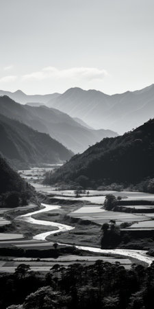 a black and white photo of a valley with a river, captured in the angura kei style. this national geographic photo showcases a vibrant play of light and shadow, creating a mesmerizing contrast. taken with a nikon d750, the gongbi technique beautifully portrays harmonious color fields, resulting in soft and atmospheric scenes. ai generatedの素材