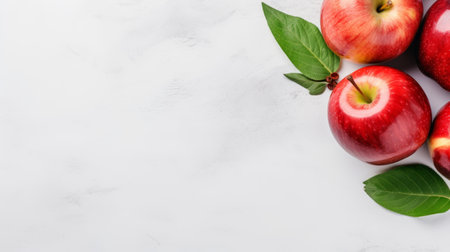 red apples, representing jewish culture, are arranged on a white countertop alongside leaves. the minimalist color palette and marble create an innovative page design. the combination of teal and crimson adds a touch of vibrancy to the daguerreian-style image. the white background enhances the overall aesthetic. ai generatedの素材