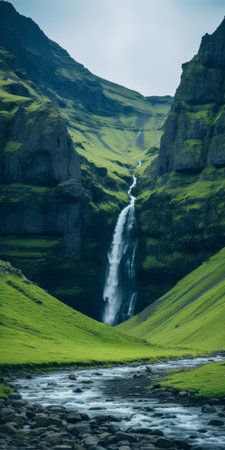 a stunning photo of a waterfall in the mountains and hills near iceland, captured in the unique style of pixelated landscapes. the image showcases a mesmerizing blend of dark cyan and green hues, creating a visually striking composition. this contest-winning photograph beautifully captures the grandiose environments and pastoral charm of the area. it exudes a sense of tranquility and showcases the flowing fabrics of theの素材