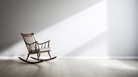 a three-dimensional rendering of a rocking chair in a room, showcasing minimalistic serenity. the chair sits on the ground, casting shadows in the style of high-key lighting. the color palette is monochromatic, with shades of gray and brown, creating a serene feeling. the use of fujifilm pro 800z enhances the simplicity of the scene, with light gray and light amber tones. ai generatedの素材