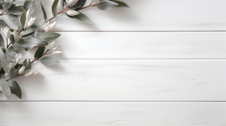 green eucalyptus leaves arranged on a white wooden surface, featuring silver and beige accents. the minimalist background showcases flower and nature motifs, creating a soft and dreamy atmosphere. this high-definition image captures the beauty of the leaves, with their natural green color and striped arrangements. ai generatedの素材