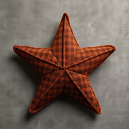 plaid star pillow in orange and black, captured in a tabletop photography style. this organic sculpted pillow features toy-like proportions, with a charming pastoral appeal in dark red and dark gray hues. the high-angle shot emphasizes the canvas texture, adding depth to the image. ai generatedの素材