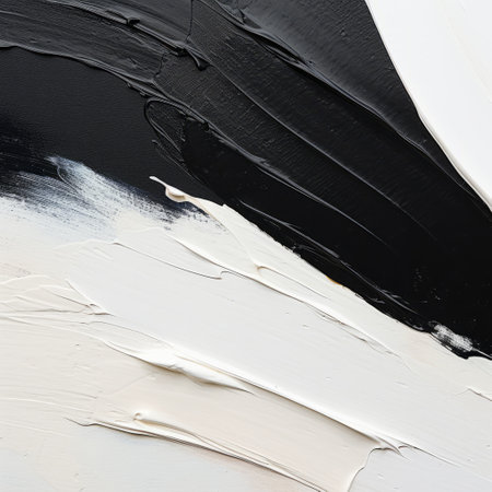 a close-up photo of a black and white painting splash, showcasing the minimalist color fields style. the image captures the bold use of impasto technique, with dark white and beige tones dominating the composition. the painting's bold yet graceful aesthetic is reminiscent of aerial photography. the artist's choice of a minimalist color palette and minimalistic brushstrokes adds to the overall simplicity and elegance of theの素材