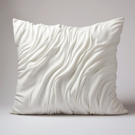 pillow with white wrinkled pattern on a grey background, inspired by the style of zbrush. the realistic rendering showcases flowing textures and fluid networks. the design, reminiscent of carlos schwabe's art, stands out against a clean white background. the ivory color adds a touch of elegance to this visually captivating image. ai generatedの素材