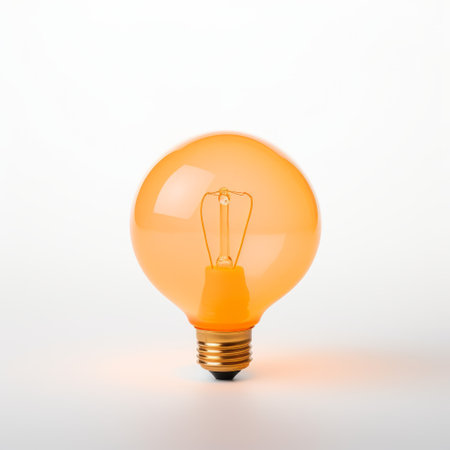 an orange light bulb, isolated on a white background, showcases its vibrant hue. the use of vray tracing creates a soft and atmospheric lighting effect. this innovative technique enhances the overall appeal of the bulb. the combination of light magenta and bronze adds a touch of elegance, while the soft yellow and indigo tones create a visually pleasing contrast. the craftsmanship of this eco-friendly lightの素材