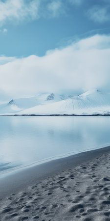 a snowy summit ridge mountain in iceland, captured on the hardangerfjord road, showcases the breathtaking beauty of nature. the photo features a minimalist typography style with a symmetrical arrangement. the image, taken with tamron 20mm f/2.8 di iii osd m1:2 and 24mm f/2.8 di iii osd m1:2 lenses, evokes a sense of tranquility and grandeur. the scene is reminiscent of a bottle rocket-esque animated gif,の素材
