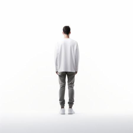 male model showcases minimalist fashion in a full-body shot against a white isolated background. the photo highlights sleek and simple style, ideal for showcasing clothing designs. with a focus on clean lines and neutral colors, this minimalist look exudes modern sophistication and timeless elegance. ai generatedの素材