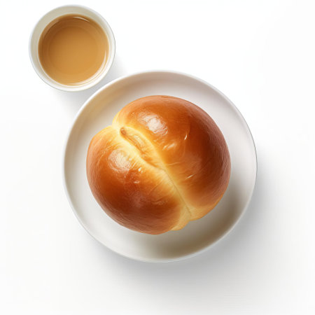 five freshly baked brioche buns, arranged in an uneven row, sit alongside a steaming cup of coffee, invitingly presented on a clean white background, evoking a sense of warmth and comfort, perfect for a cozy breakfast or brunch setting, ideal for food bloggers and coffee enthusiasts alike. ai generatedの素材