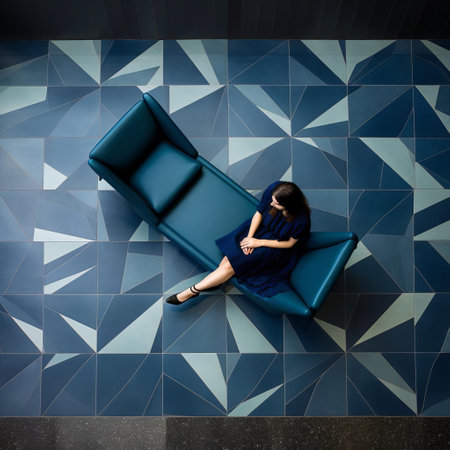 the indigo tile, a mesmerizing fusion of hyperspace noir and graphic print-based design, features a mosaic pattern of light teal and midnight blue intersecting planes, exuding symmetry and grit, set against a polished concrete backdrop, evoking a sense of futuristic urban chic. ai generatedの素材