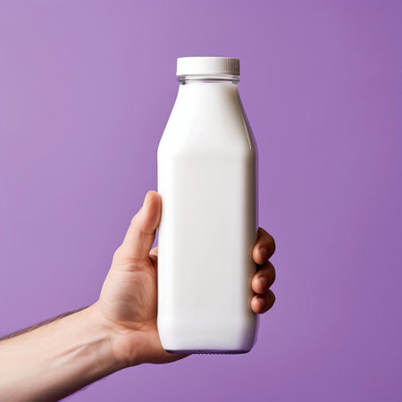 a milk bottle stands out against a plain violet background, held firmly by a male hand, showcasing an empty white label waiting to be customized, providing a high-detailed, ready-made mockup perfect for branding, packaging, and labeling design projects. ai generatedの素材