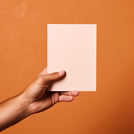 a parent's hand cradles a cocktail glass with an empty white label, set against a rustic, plain background, in this highly detailed, ready-made mockup, perfect for branding and labeling projects, featuring a clean and minimalist design, ideal for beverage and spirits marketing. ai generatedの素材