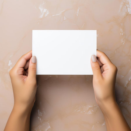 a beautiful girl's hand gently holds a tea bottle with an empty white label against a plain taupe background, showcasing a high-detailed, ready-made mockup perfect for branding and packaging design, product photography, and advertising concepts, ideal for tea enthusiasts and beverage industry professionals. ai generatedの素材