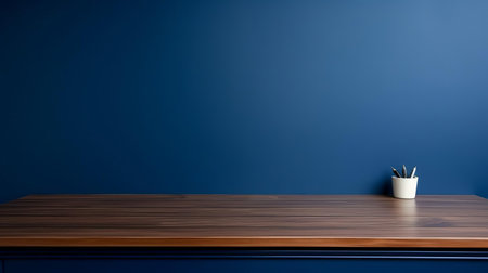 a sleek, modern frame in a soothing midnight blue color sits elegantly on a wooden table, creating a serene atmosphere, perfect for showcasing cherished memories, artwork, or decorative pieces, adding a touch of sophistication to any room's decor with its minimalist design. ai generatedの素材