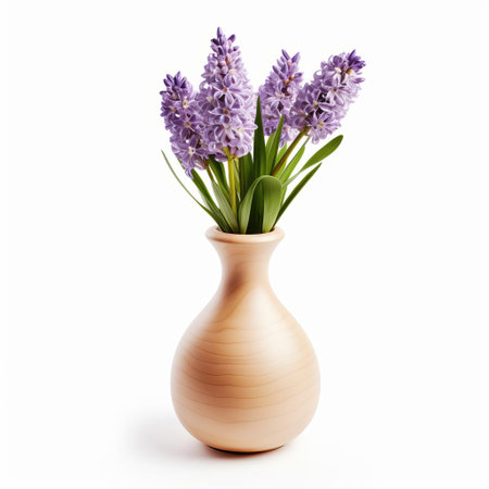 the elegant amphora vase, adorned with intricate designs, cradles a beautiful hyacinth flower, its delicate petals and vibrant colors popping against a pristine white background, showcasing a stunning still-life composition perfect for home decor inspiration and flower arrangement ideas. ai generatedの素材