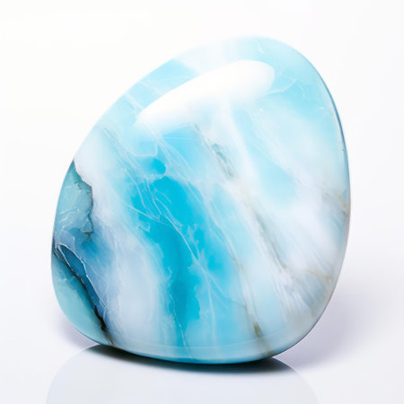 the larimar stone, a rare and exquisite gemstone, glistens against a pristine white background, showcasing its mesmerizing blue hues and intricate patterns, evoking a sense of tropical tranquility and caribbean charm, perfect for jewelry makers and collectors of unique minerals. ai generatedの素材