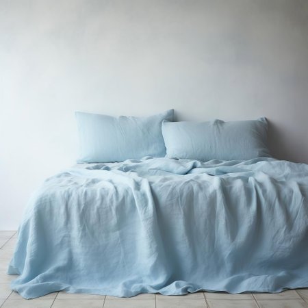 the serene sky blue linen plain sheet drapes elegantly, exuding a sense of calmness and tranquility, perfect for a relaxing bedroom ambiance, evoking feelings of softness and comfort, ideal for a peaceful slumber, and adding a touch of sophistication to any home decor. ai generatedの素材