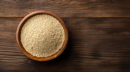 quinoa is beautifully displayed on a rustic wood table, showcasing its nutritious and protein-rich goodness in a stunning top view, perfect for healthy eating and meal prep inspiration, highlighting the benefits of whole grain and plant-based diets. ai generatedの素材