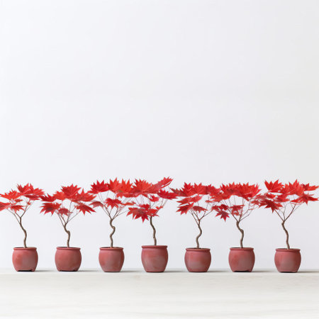 a row of vibrant red maple trees in pots sits elegantly on a pristine white background, showcasing their stunning autumn foliage, perfect for adding a pop of color to any indoor or outdoor space, ideal for gardening enthusiasts and nature lovers alike. ai generatedの素材