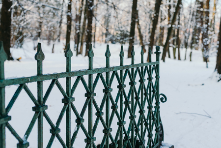 Metallic Fence On Snow Covered Landの写真素材