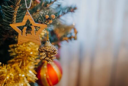Christmas tree decoration close up. Xmas holyday concept, colorful traditional ornamentsの写真素材