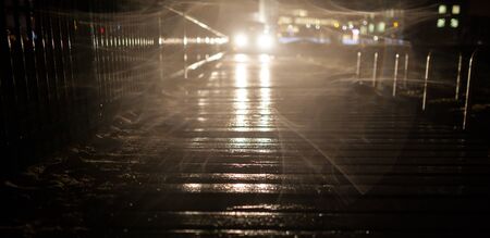 shot of the car passes over a wooden bridge in an unauthorized place