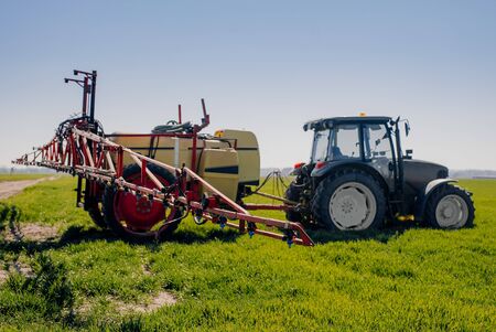View of Tractor Ready to Spraying Herbicides.の写真素材