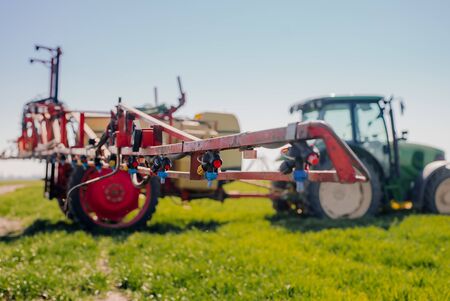 View of Tractor Ready to Spraying Herbicides.の写真素材
