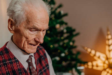 Portrait of Senior Retired Man Sitting at Homeの写真素材