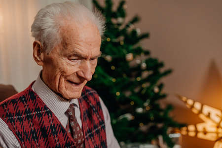 Portrait of Senior Retired Man Sitting at Homeの写真素材