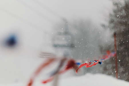 Snow Falling in Winter at Ski Slopeの写真素材