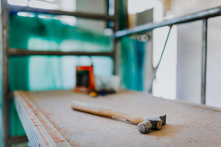 Steel Hammer Lying on Scaffoldingの写真素材