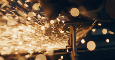 Worker Using Industrial Grinder Metalwork Industry