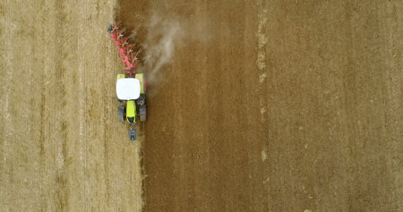 Farming - Tractor plowing field 4K