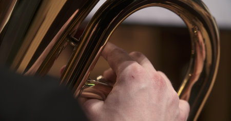 musician playing trumpet at concertの写真素材