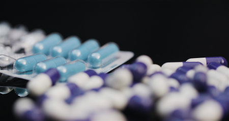 Medical tablets and pills, pharmaceutical industry Healthcare medicaments capsules rotating.の写真素材