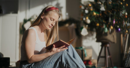 Woman Reading Book Portraitの写真素材