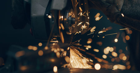Grinding Metal Sparks Steel Cutting At Industrial Workshopの写真素材