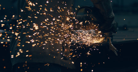 Grinding Metal Sparks Steel Cutting At Industrial Workshopの写真素材